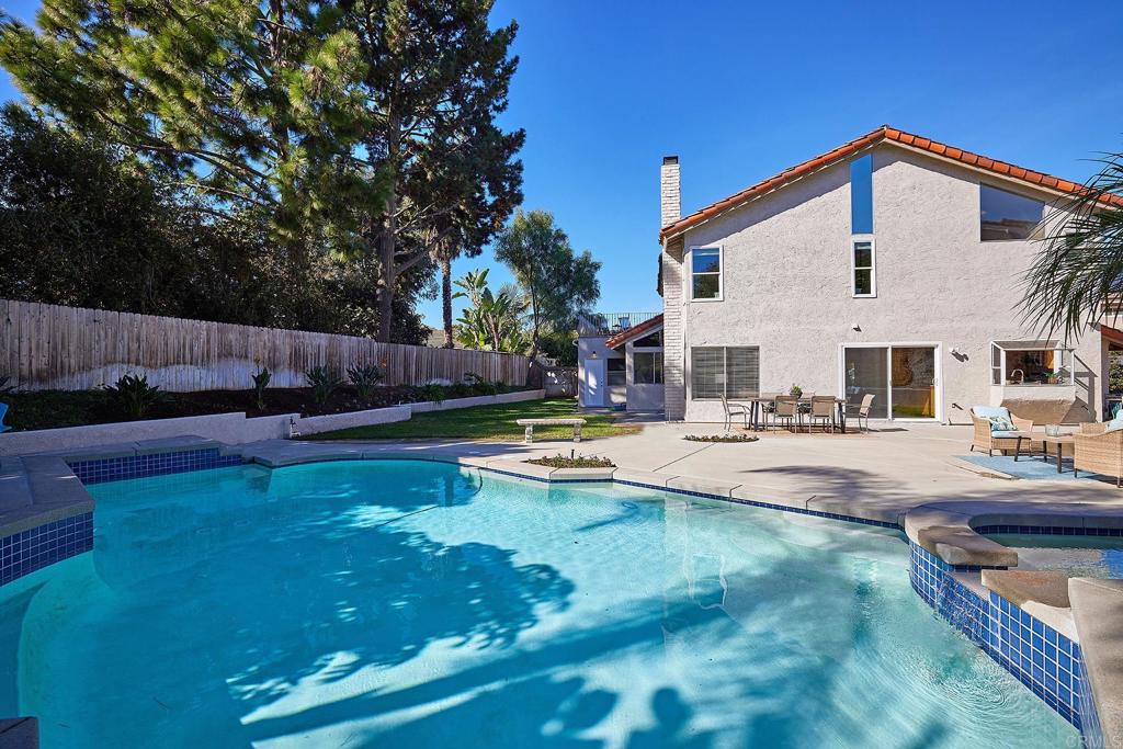 2107 Meadowgreen Court Encinitas, CA 92024 - Photo 35 of 49 a view of a house with swimming pool and sitting area