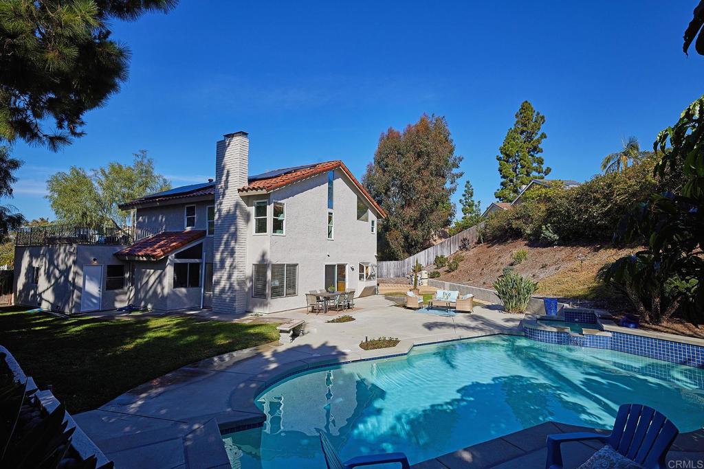 2107 Meadowgreen Court Encinitas, CA 92024 - Photo 36 of 49 a view of a house with backyard and sitting area