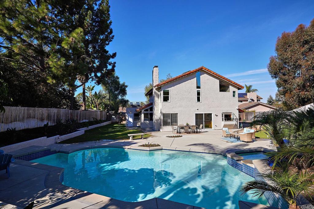2107 Meadowgreen Court Encinitas, CA 92024 - Photo 37 of 49 a view of a house with backyard and sitting area