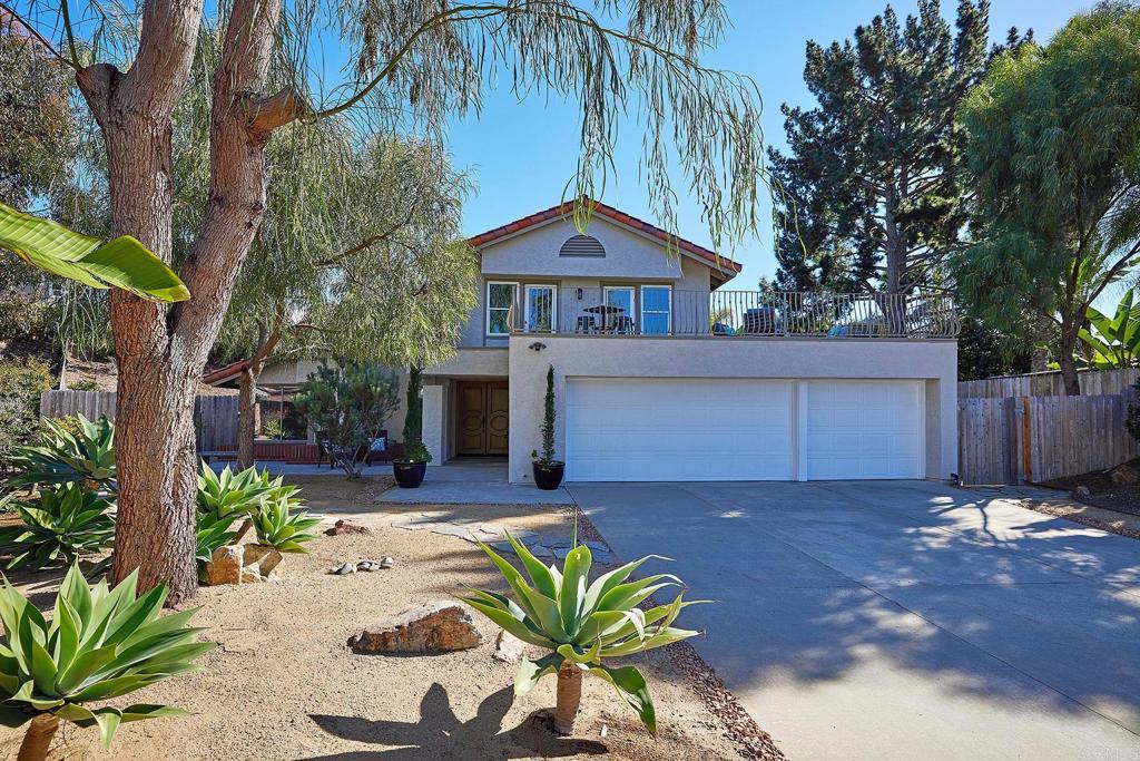 2107 Meadowgreen Court Encinitas, CA 92024 - Photo 5 of 49 a house with a bench in front of house