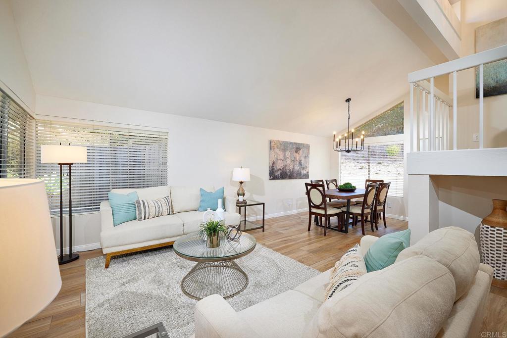 2107 Meadowgreen Court Encinitas, CA 92024 - Photo 7 of 49 a living room with furniture and a large window