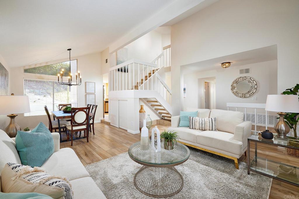 2107 Meadowgreen Court Encinitas, CA 92024 - Photo 9 of 49 a living room with furniture and a large window