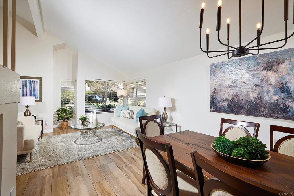2107 Meadowgreen Court Encinitas, CA 92024 - Photo 10 of 49 a view of a dining room with furniture window and wooden floor