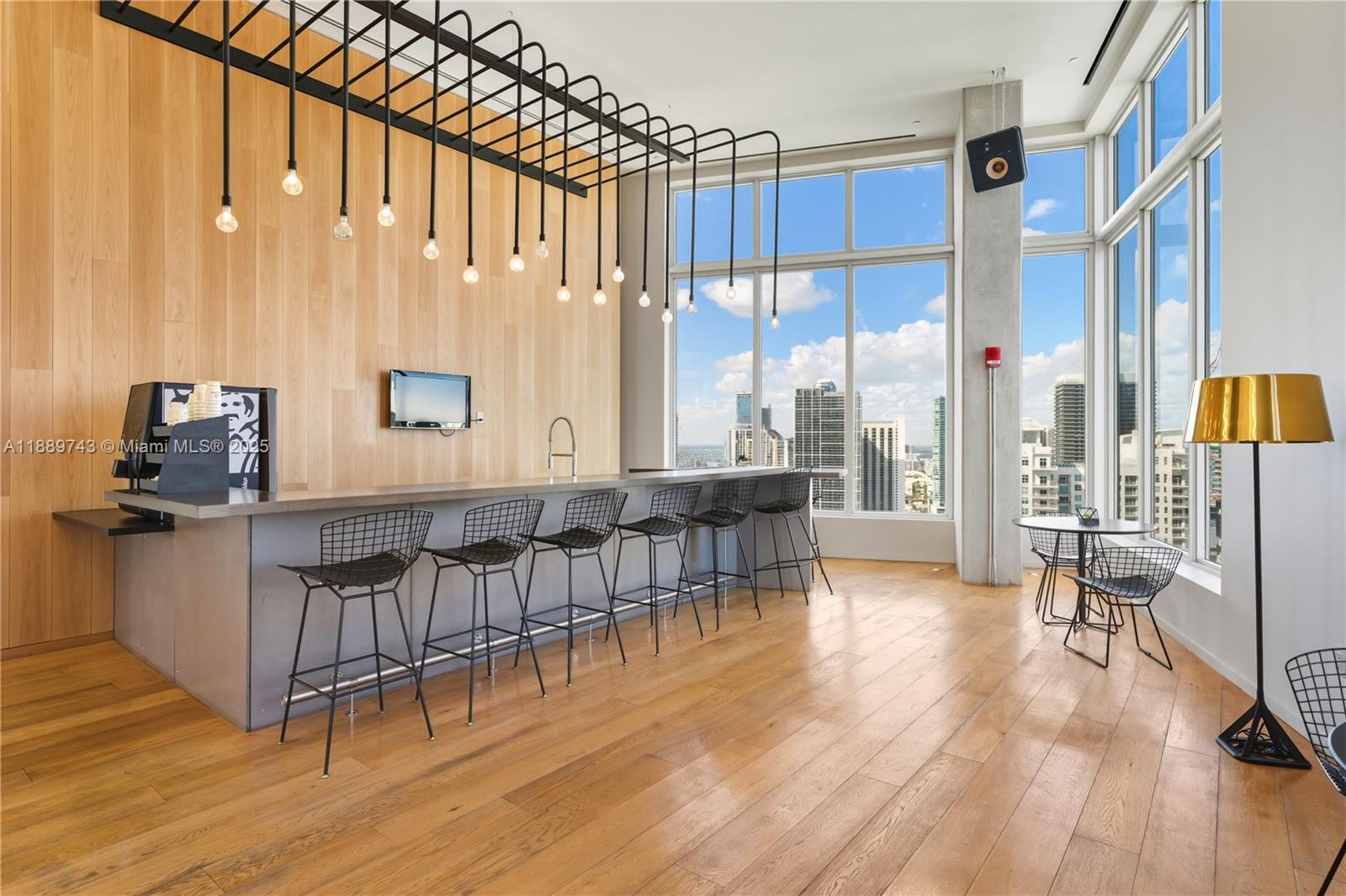 151 Southeast 1st Street, Unit 2002 Miami, FL 33131 - Photo 13 of 16 a view of a livingroom with furniture and floor to ceiling window