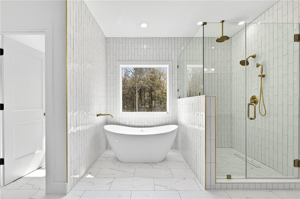 88 Carolyn Path Rockmart, GA 30153 - Photo 27 of 73 a bathroom with a toilet and a shower