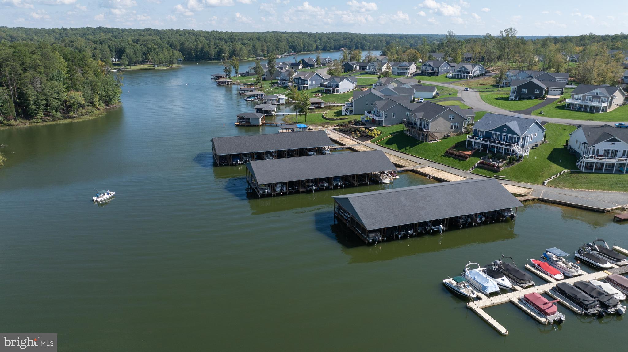 Lot 46 Sunset Loop Mineral, VA 23117 - Photo 2 of 10 an aerial view of a house with pool lake view and mountain view