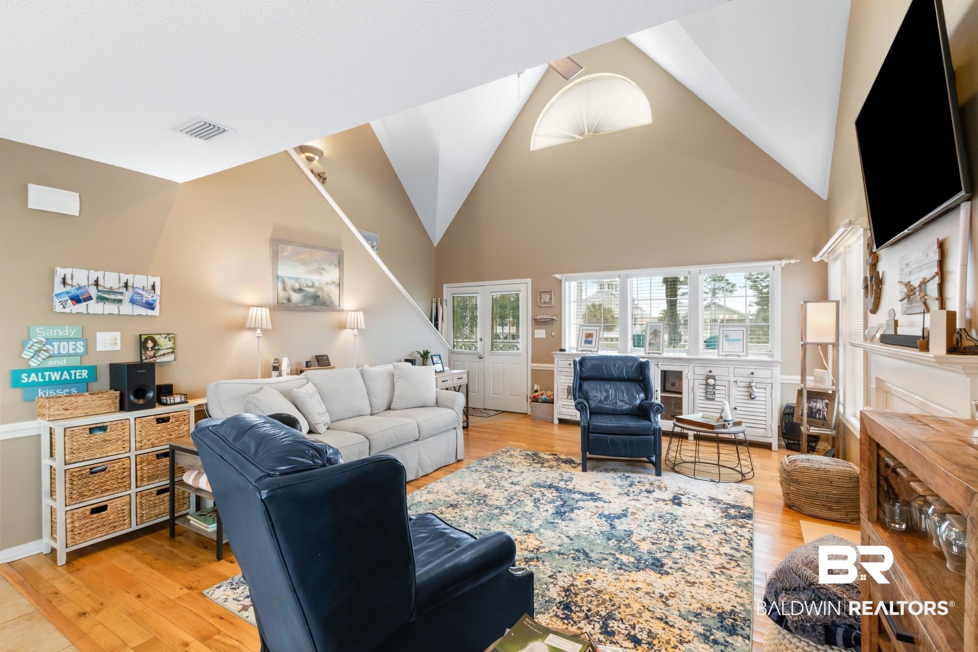328 Windmill Ridge Road Gulf Shores, AL 36542 - Photo 7 of 47 Living room with light wood-type flooring and high vaulted ceiling