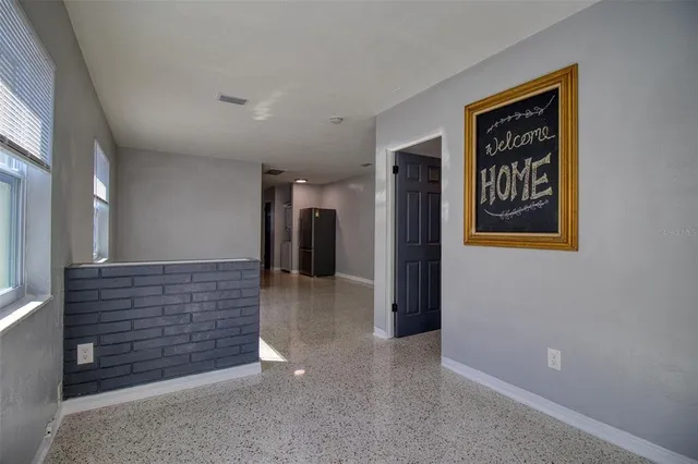 a view of hallway with stairs