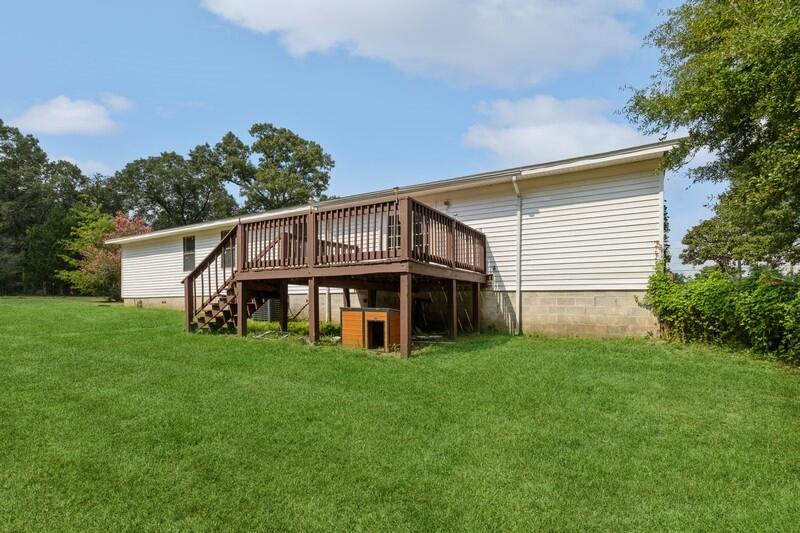 5867 Oak Hill Road Crestview, FL 32536 - Photo 7 of 33 a view of a house with a yard