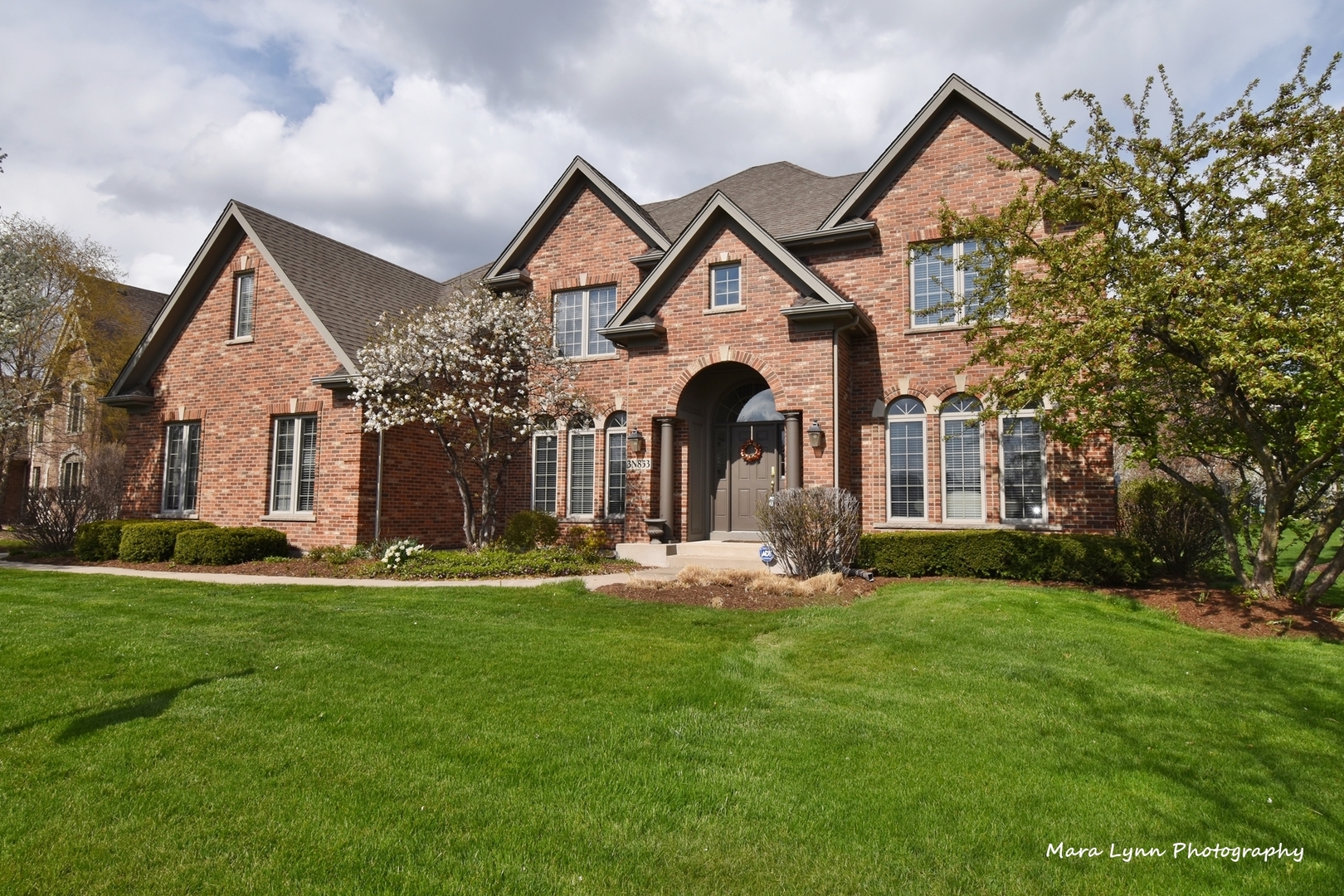 3N853 Walt Whitman Road Campton Hills, IL 60175 - Photo 3 of 48 a front view of a house with a yard