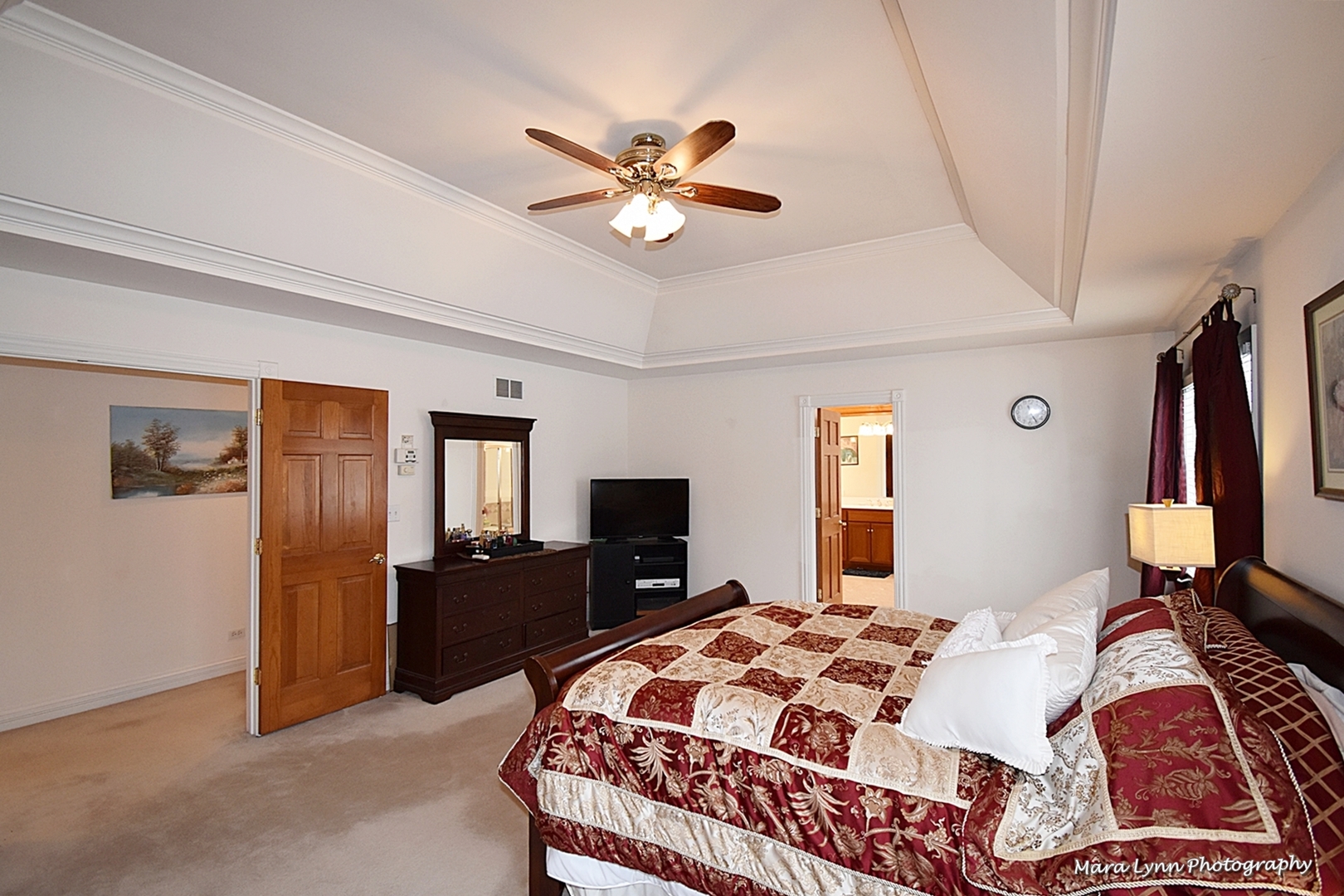 3N853 Walt Whitman Road Campton Hills, IL 60175 - Photo 24 of 48 a bedroom with a bed and a chandelier