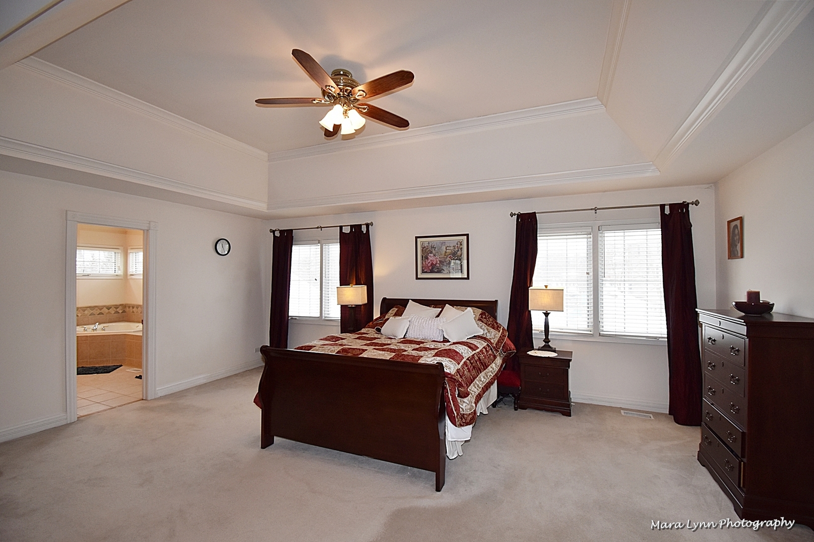 3N853 Walt Whitman Road Campton Hills, IL 60175 - Photo 25 of 48 a bedroom with a bed and a chandelier