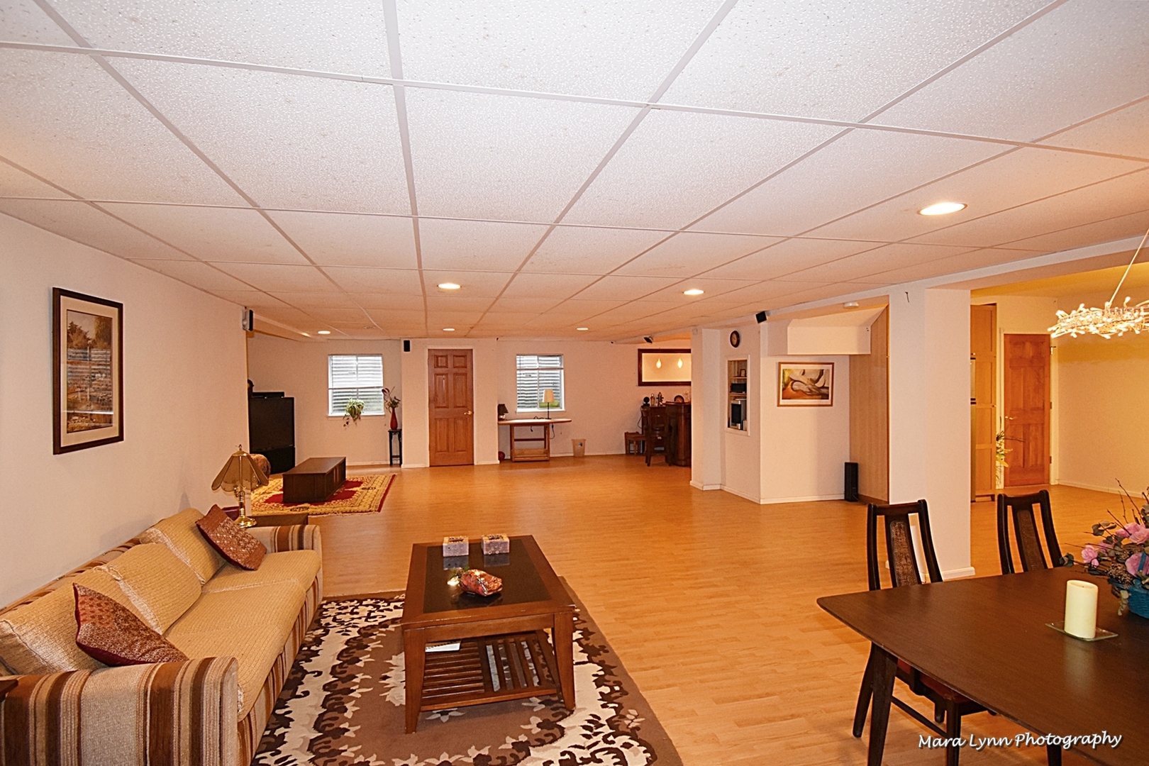 3N853 Walt Whitman Road Campton Hills, IL 60175 - Photo 41 of 48 a living room with furniture a large window with kitchen view