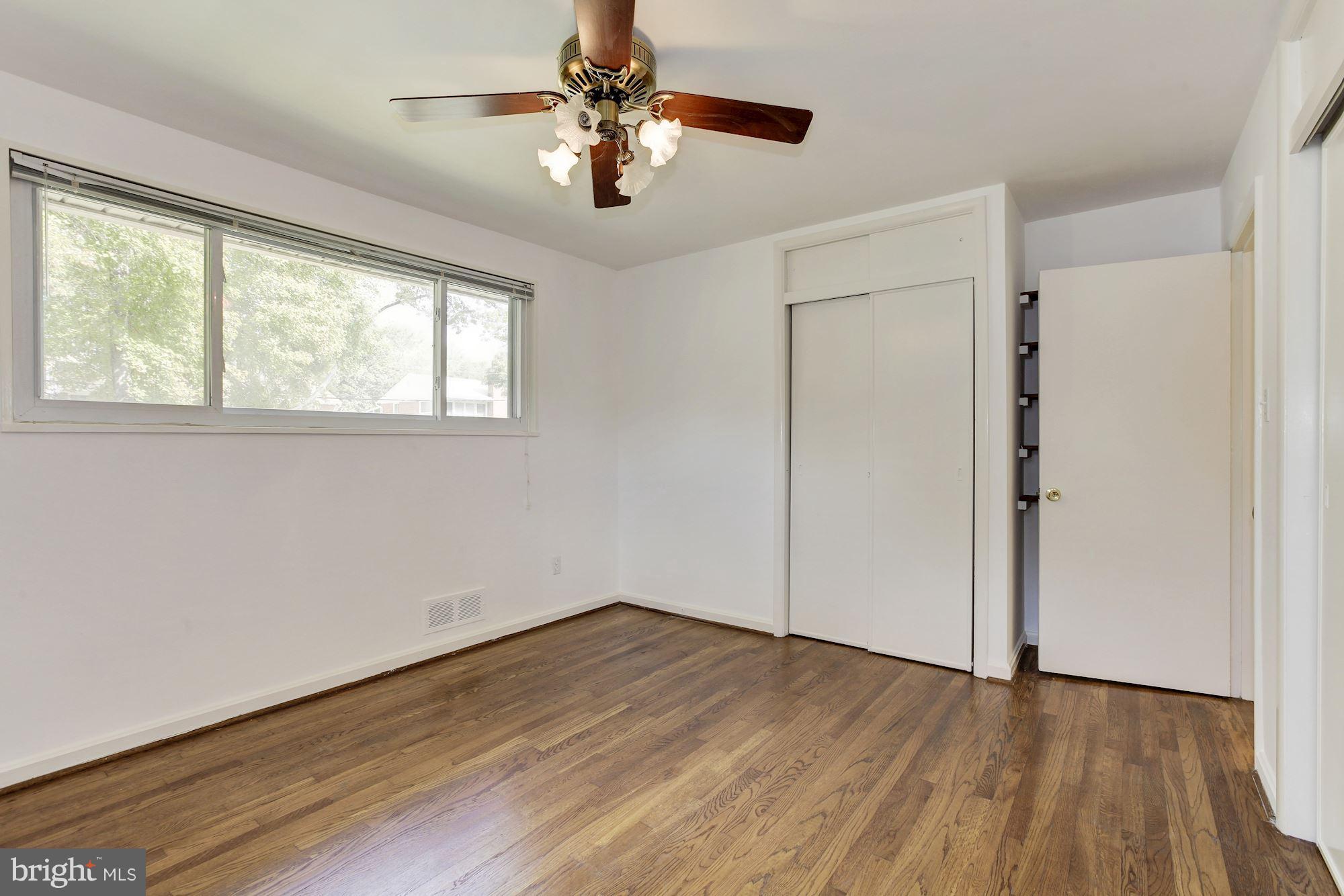 3926 Joliet Street Silver Spring, MD 20906 - Photo 13 of 30 Master Bedroom with Closet and Shelving Area