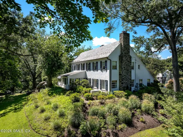 a house view with a garden space