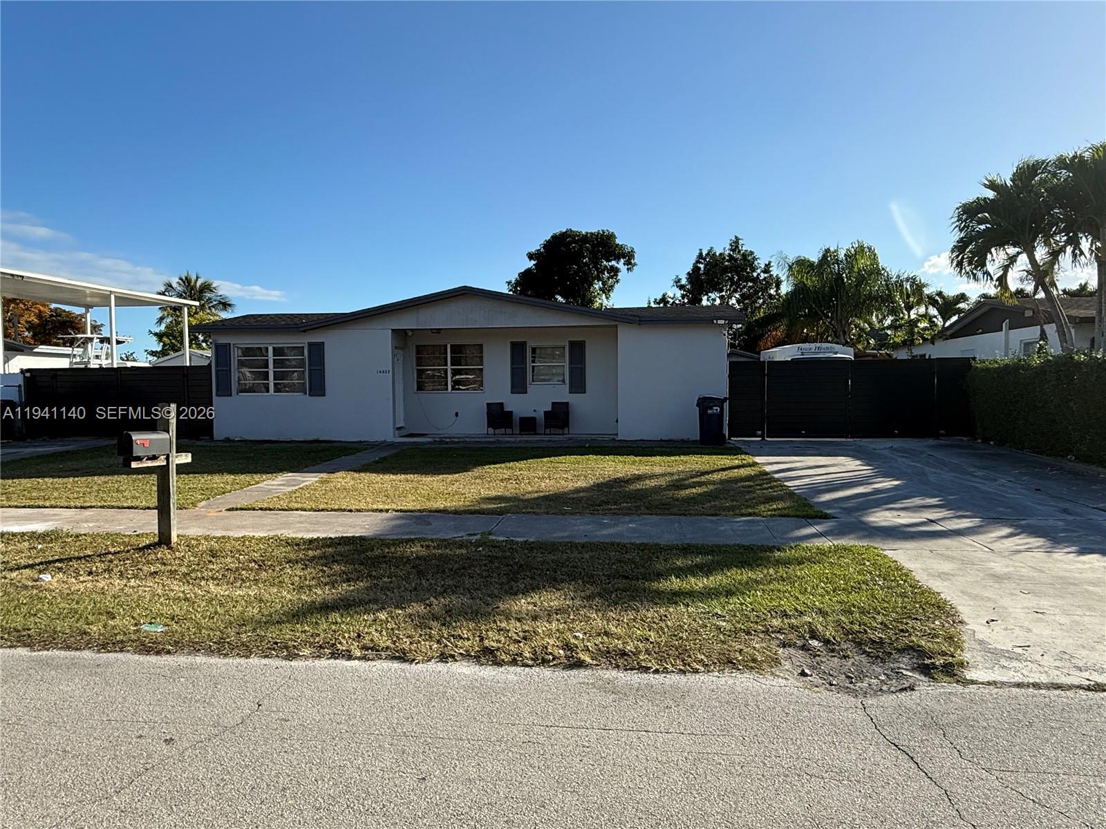 14932 Southwest 297th Terrace Homestead, FL 33033 - Photo 2 of 9 a swimming pool view with a outdoor space