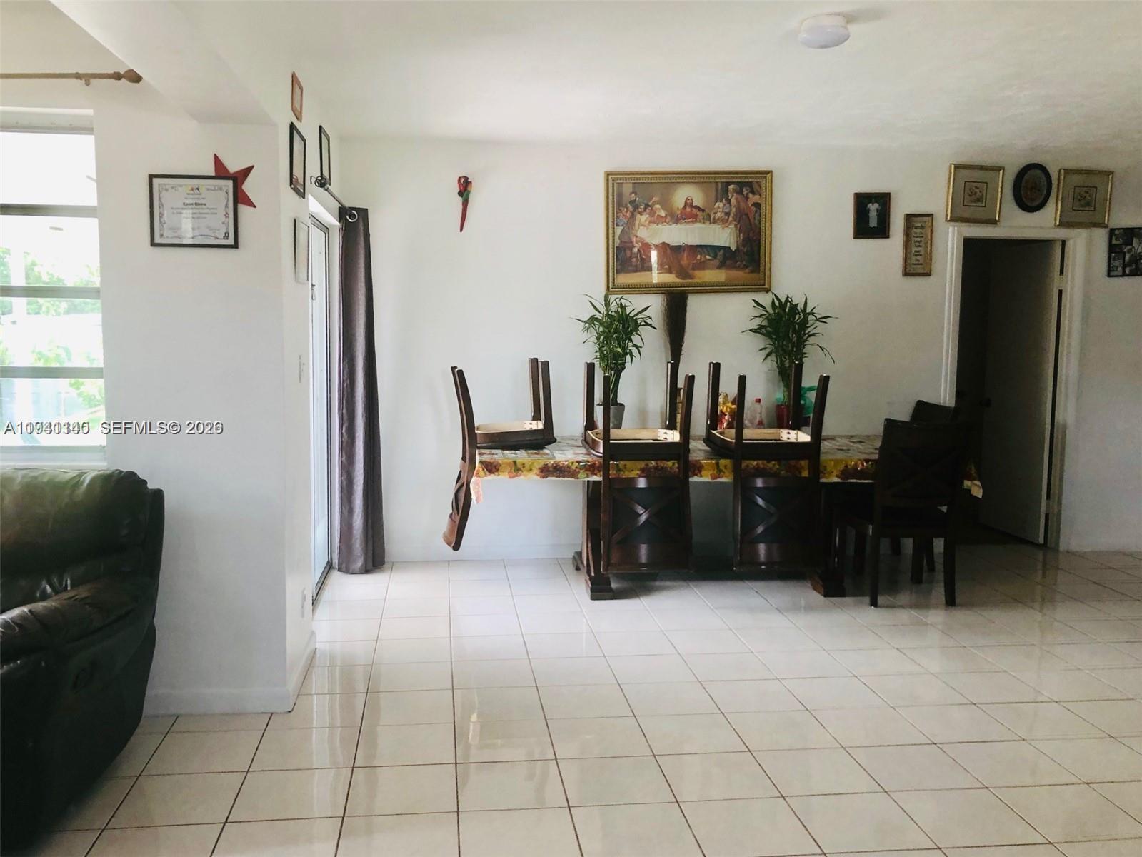 14932 Southwest 297th Terrace Homestead, FL 33033 - Photo 7 of 9 a living room with furniture