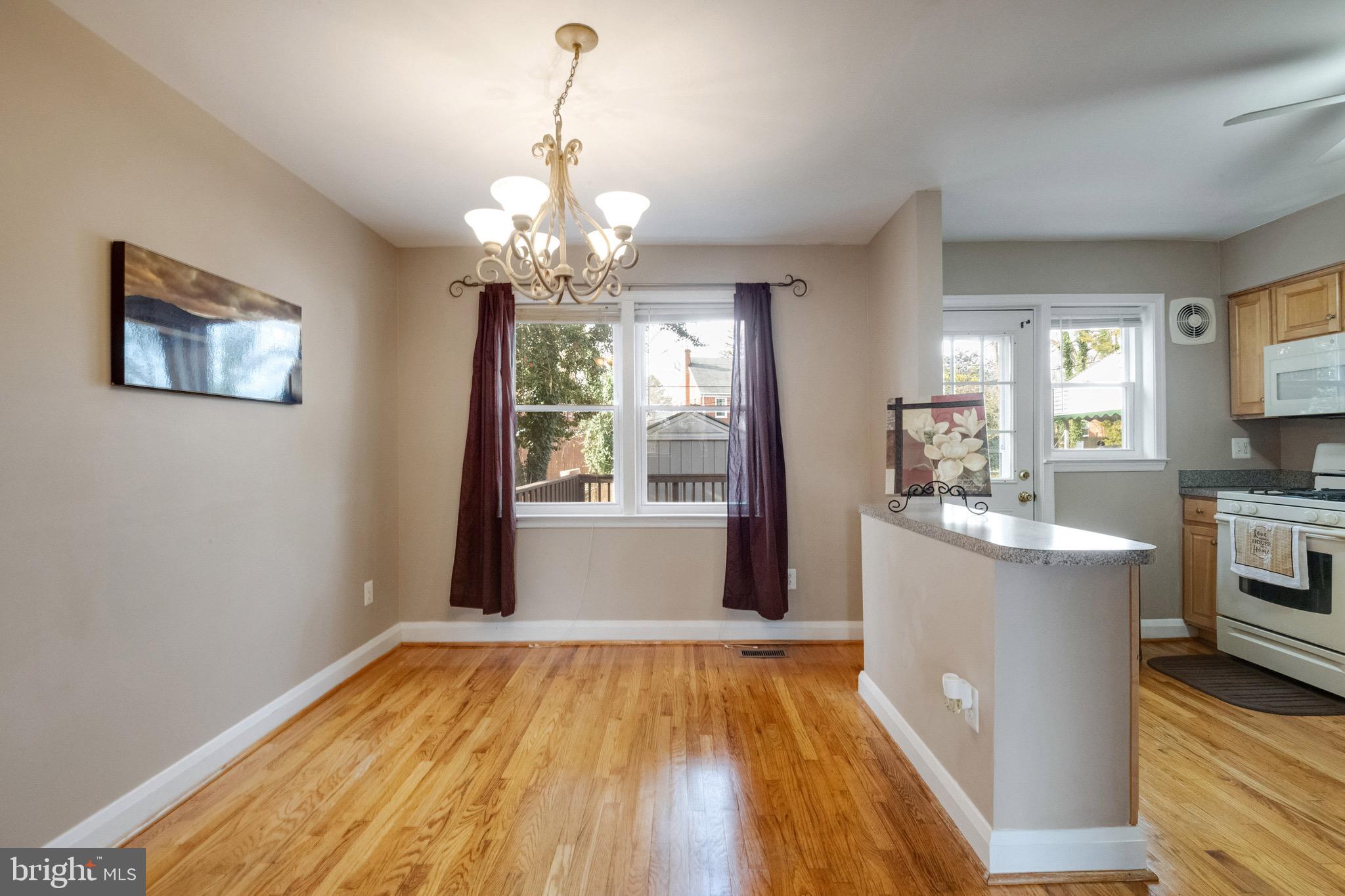 142 Cherrydell Road Catonsville, MD 21228 - Photo 11 of 31 Open Kitchen & Dining w/ Hardwood