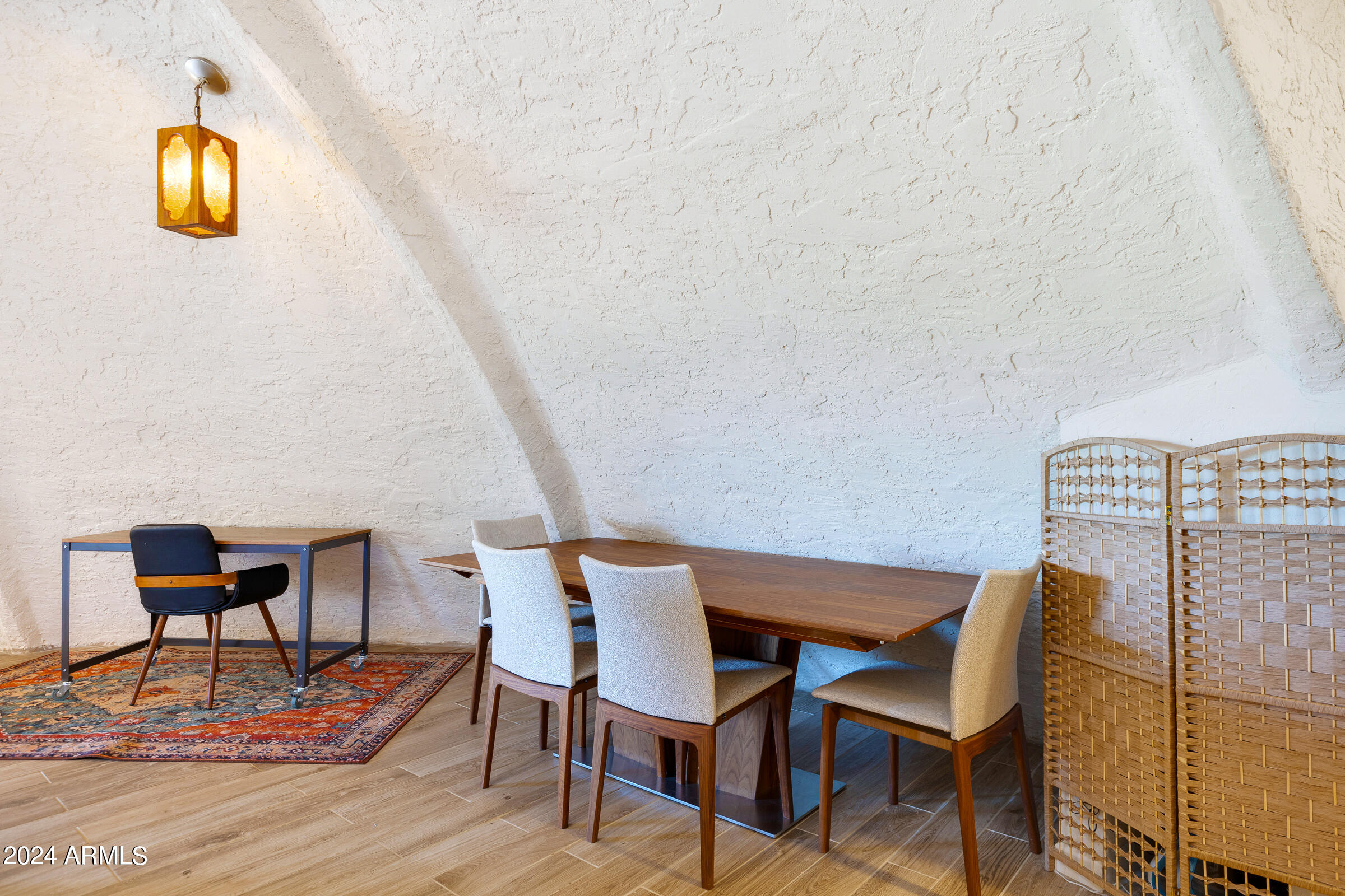 625 South Arroya Road Apache Junction, AZ 85119 - Photo 14 of 48 a dining room with furniture and wooden floor