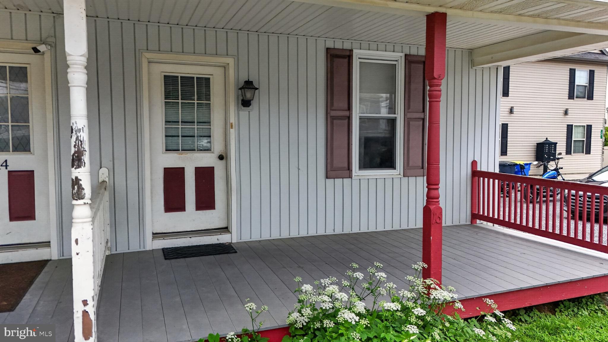 14 North Kinzer Road Kinzers, PA 17535 - Photo 15 of 34 Charming porch with inviting entryway.