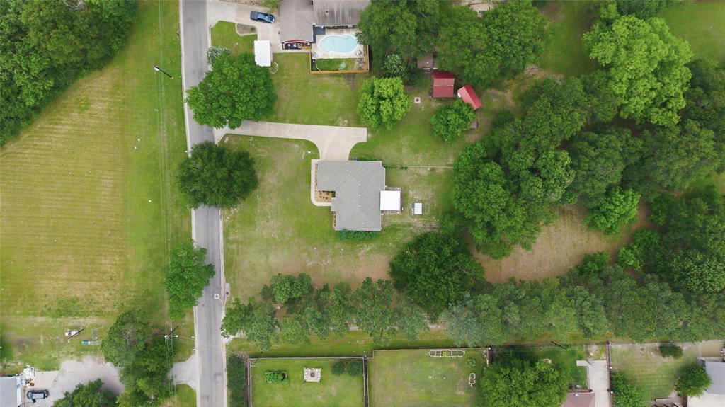 2917 Harlow Road Commerce, TX 75428 - Photo 36 of 40 an aerial view of residential house with outdoor space and swimming pool