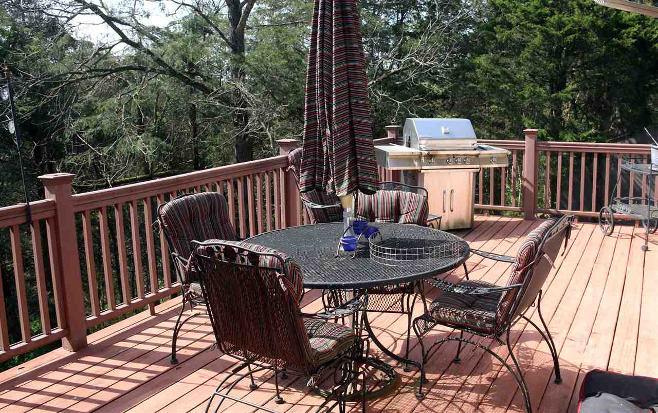 42 Eureka Mill Road Staunton, VA 24401 - Photo 11 of 29 a view of a table and chairs on the roof deck