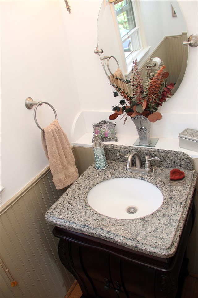 42 Eureka Mill Road Staunton, VA 24401 - Photo 12 of 29 a dining table with a sink and a mirror