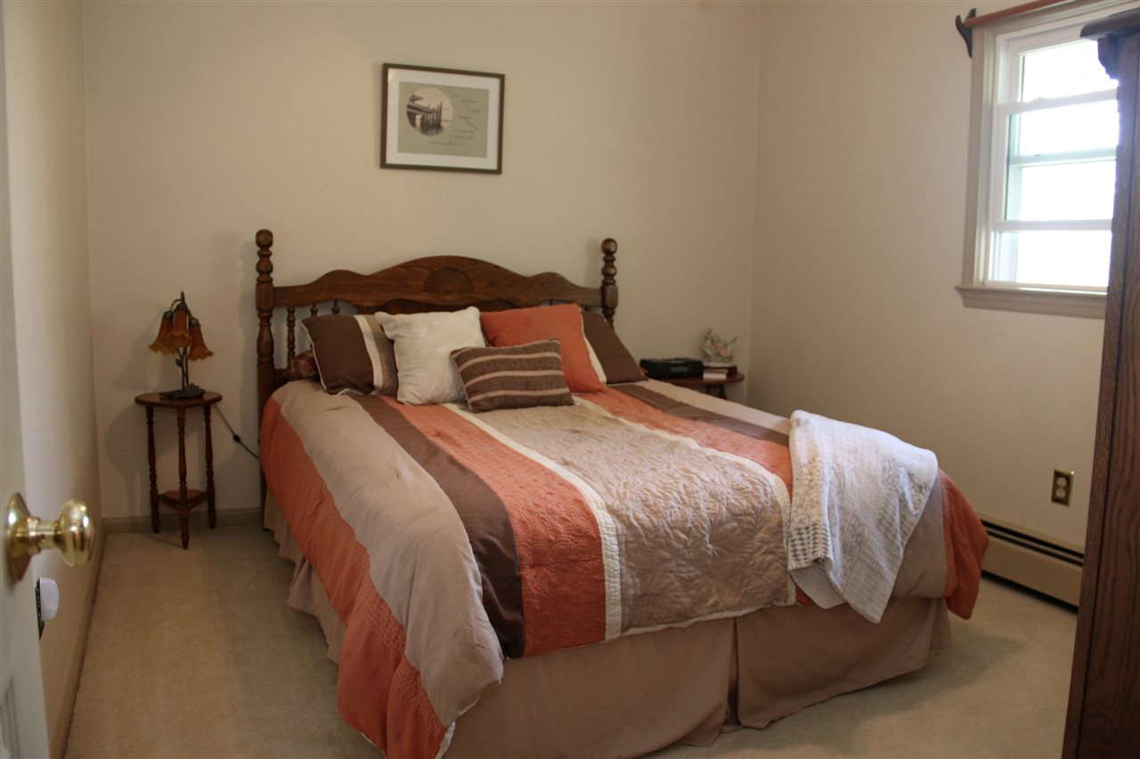 42 Eureka Mill Road Staunton, VA 24401 - Photo 17 of 29 a bed sitting in a bedroom next to a window