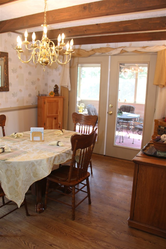 42 Eureka Mill Road Staunton, VA 24401 - Photo 9 of 29 a view of a dining room with furniture window and wooden floor