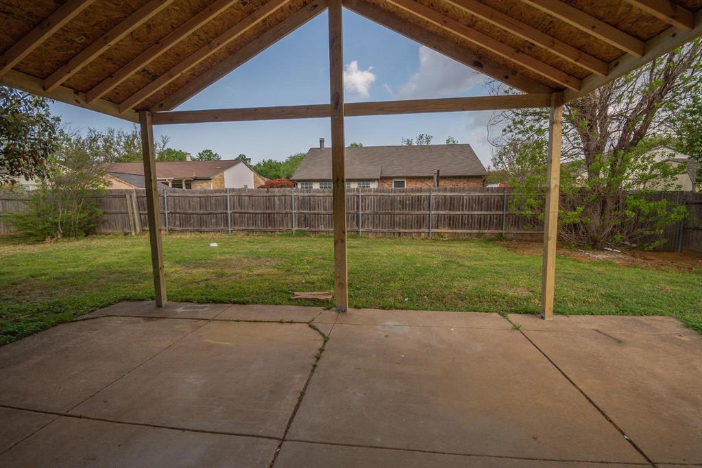 3825 Hackberry Lane Bedford, TX 76021 - Photo 19 of 24 a view of a backyard
