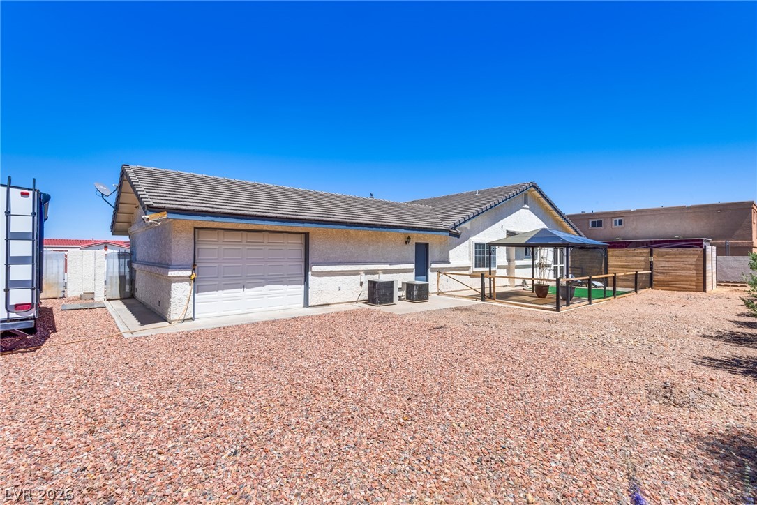 524 Swallow Cove Boulder City, NV 89005 - Photo 45 of 58 A desert oasis with a private garage and a charming outdoor gazebo.