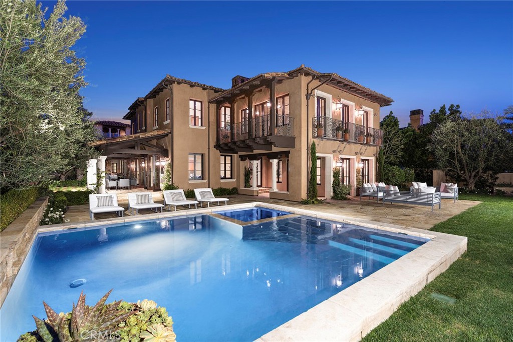 21 Shell Beach Newport Coast, CA 92657 - Photo 6 of 8 a view of a house with swimming pool and sitting area