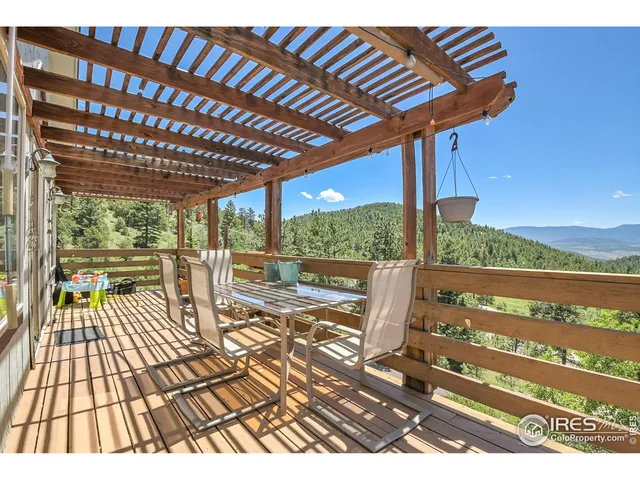 a view of balcony with furniture