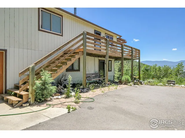 a house with trees in the background