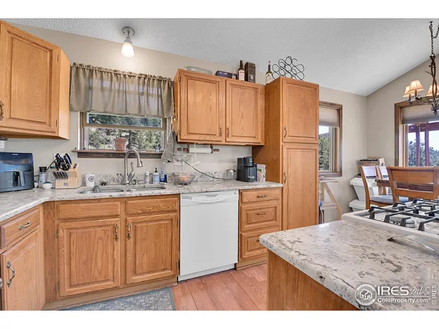 a view of living room and kitchen