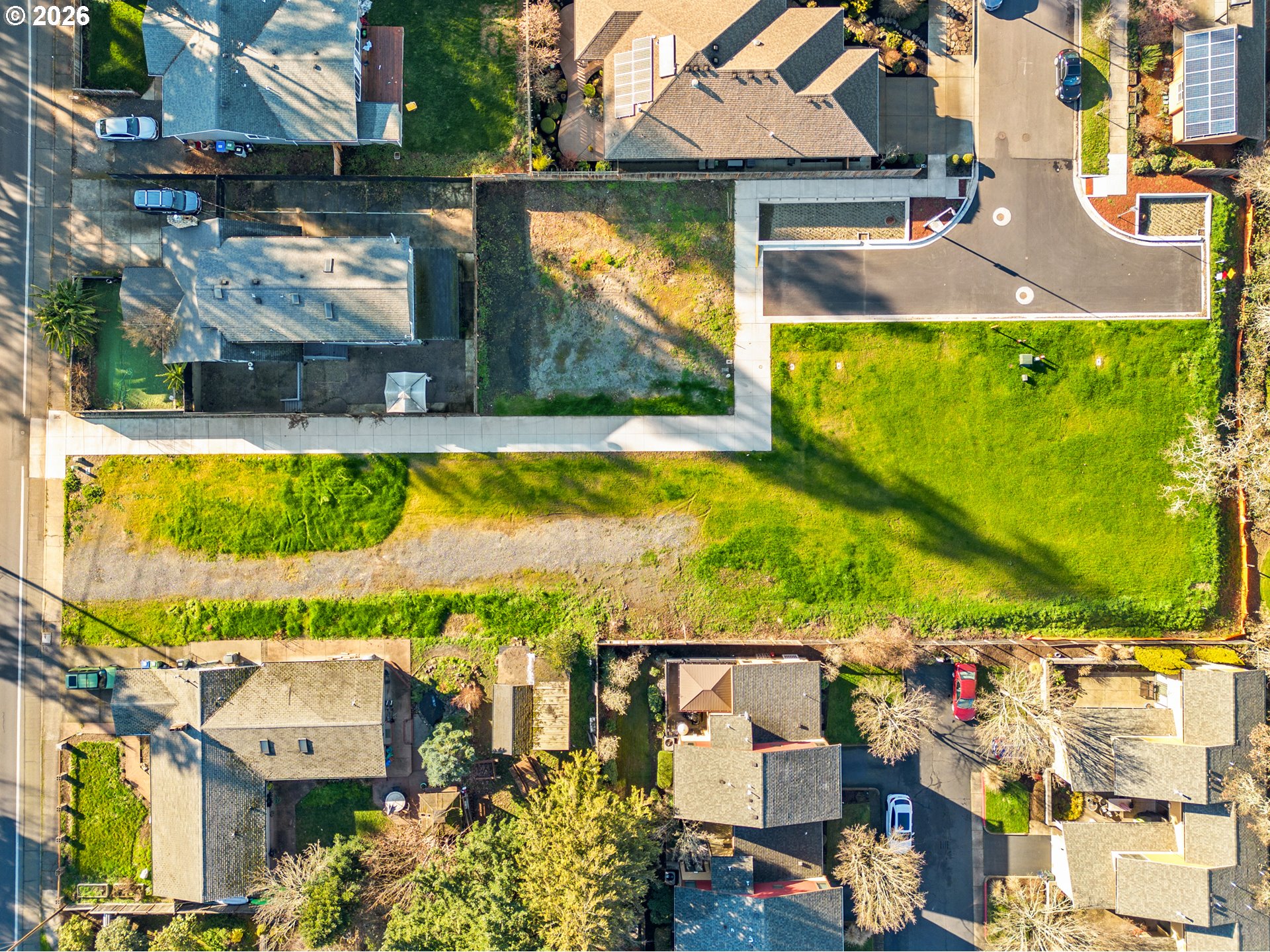 Piper Lane Eugene, OR 97401 - Photo 16 of 16 an aerial view of residential houses with outdoor space and swimming pool