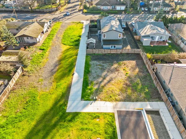 a view of swimming pool with a yard