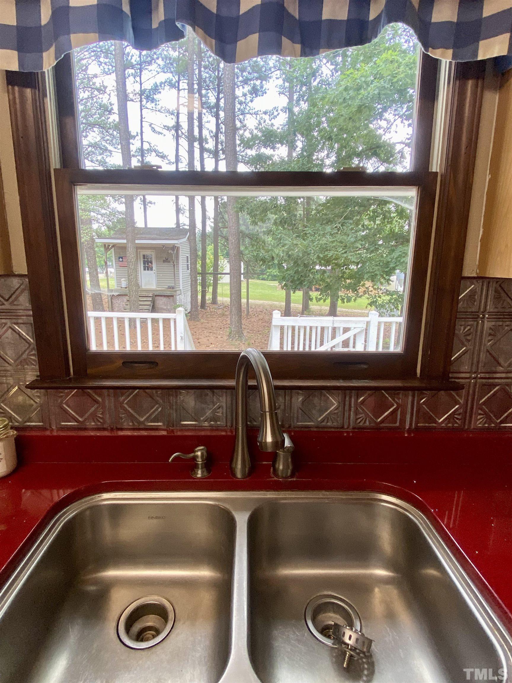 1887 Burnside Road Oxford, NC 27565 - Photo 11 of 42 a room with pool table and a large window
