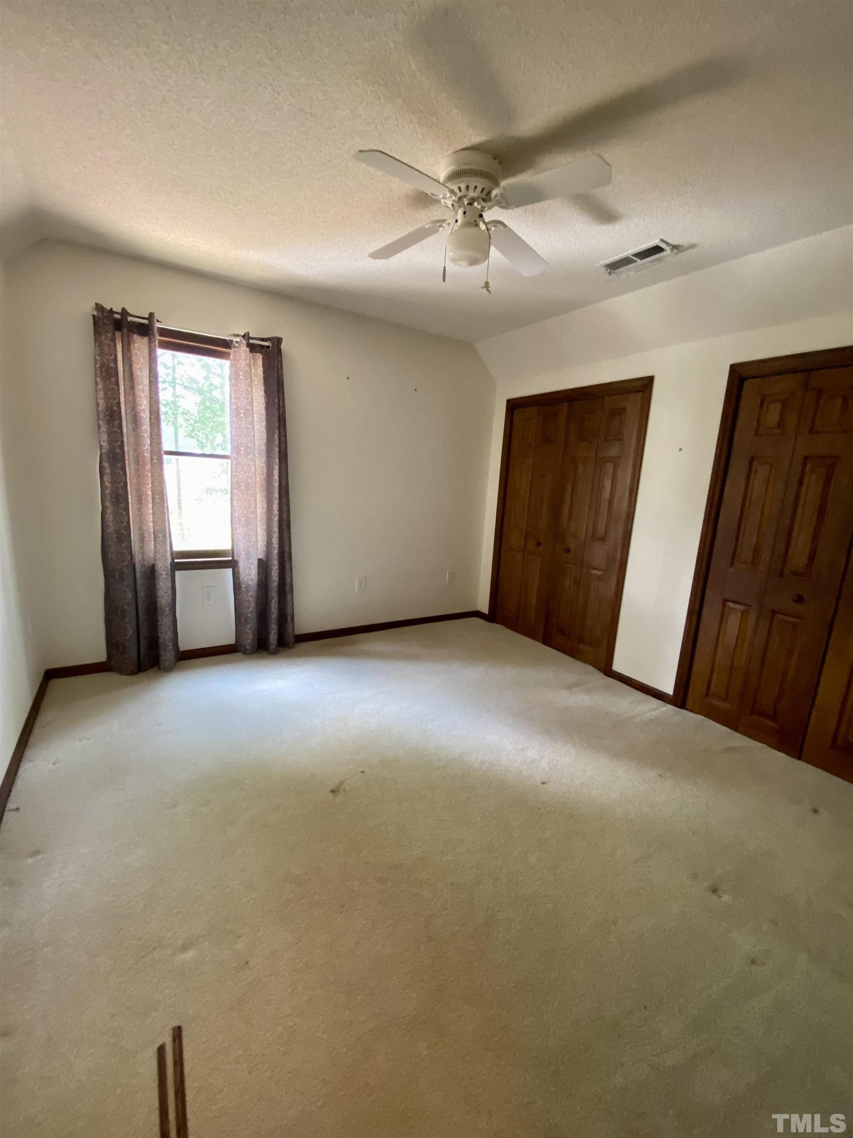 1887 Burnside Road Oxford, NC 27565 - Photo 22 of 42 a view of an empty room with a window
