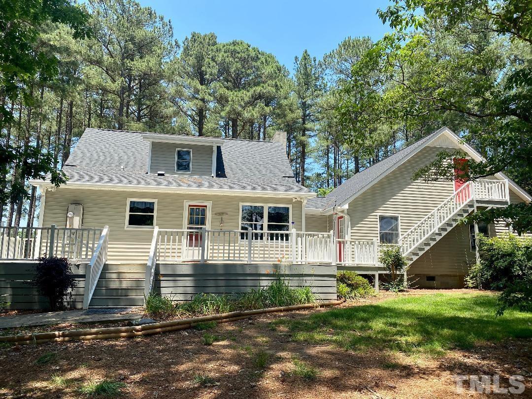 1887 Burnside Road Oxford, NC 27565 - Photo 32 of 42 front view of a house with a yard