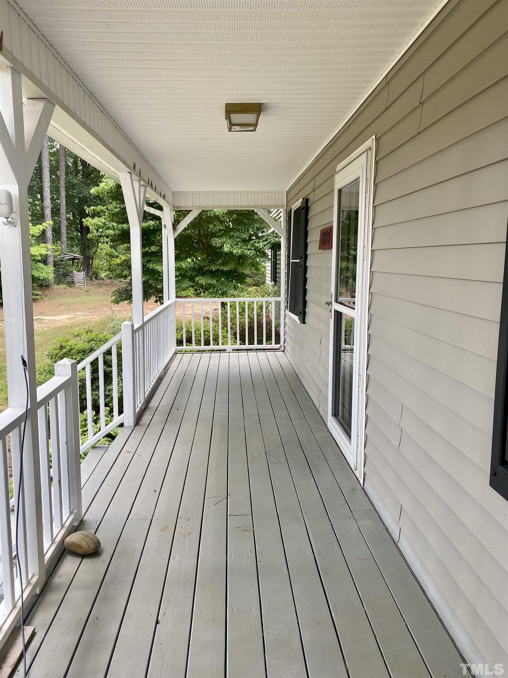 1887 Burnside Road Oxford, NC 27565 - Photo 35 of 42 a view of deck with wooden floor and outdoor space