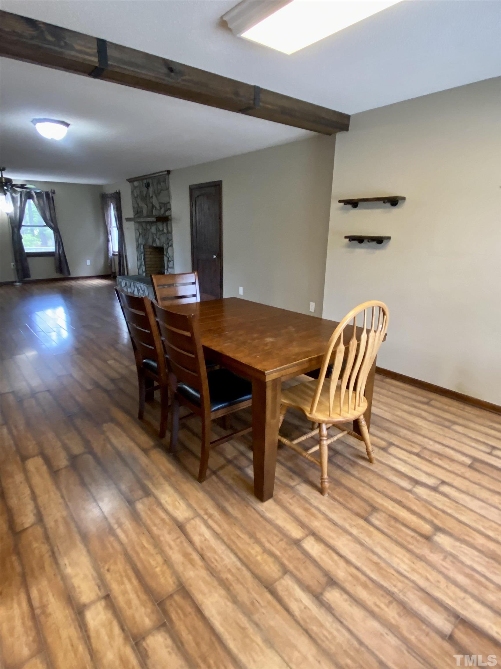 1887 Burnside Road Oxford, NC 27565 - Photo 8 of 42 a dining room with furniture and wooden floor