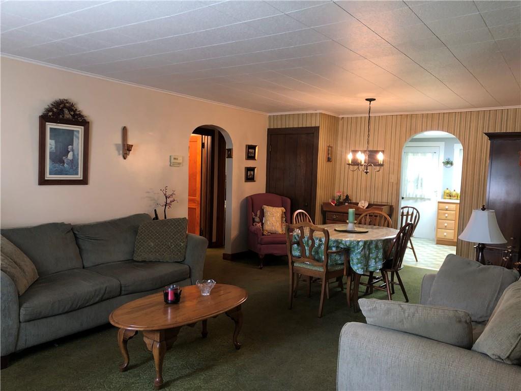 1104 13th Street Conway, PA 15027 - Photo 11 of 31 a living room with furniture and wooden floor