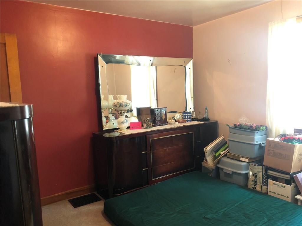 1104 13th Street Conway, PA 15027 - Photo 14 of 31 a room with furniture and window