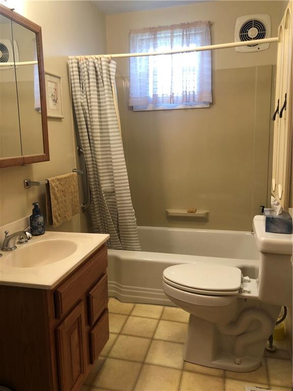 1104 13th Street Conway, PA 15027 - Photo 16 of 31 a bathroom with a sink a toilet and shower