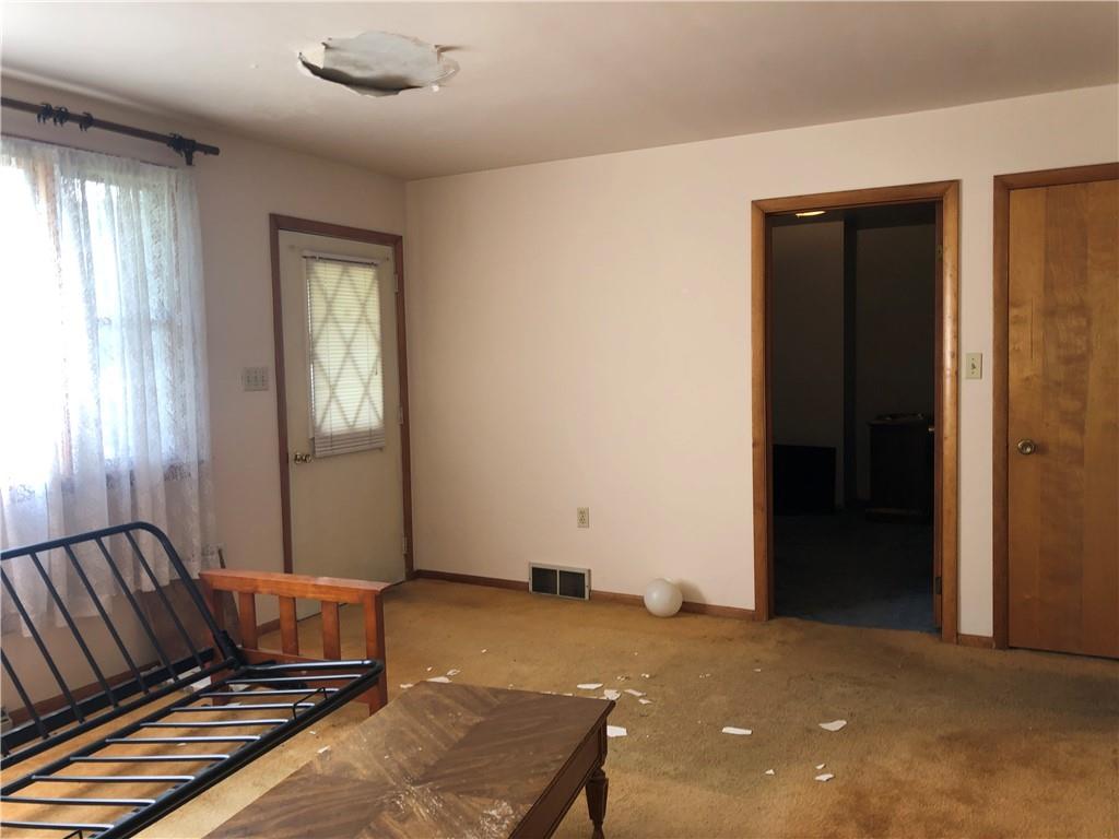 1104 13th Street Conway, PA 15027 - Photo 25 of 31 an empty room with windows