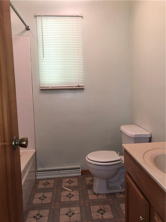 1104 13th Street Conway, PA 15027 - Photo 27 of 31 a bathroom with a sink and a toilet