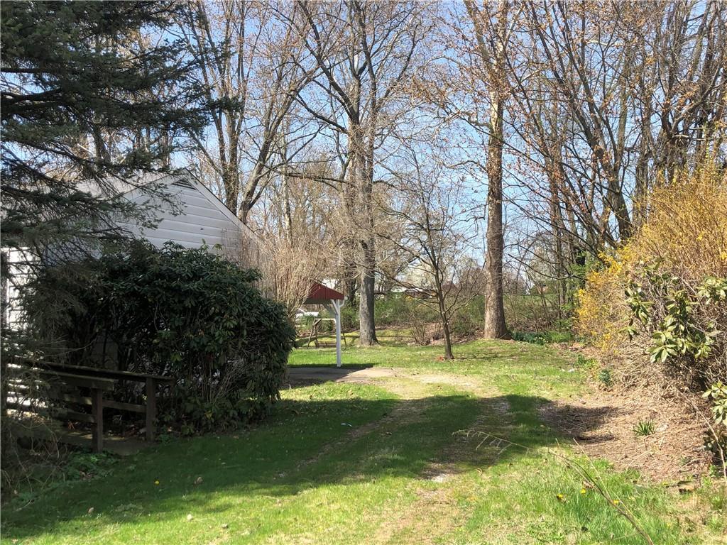 1104 13th Street Conway, PA 15027 - Photo 7 of 31 a view of yard with swimming pool and green space