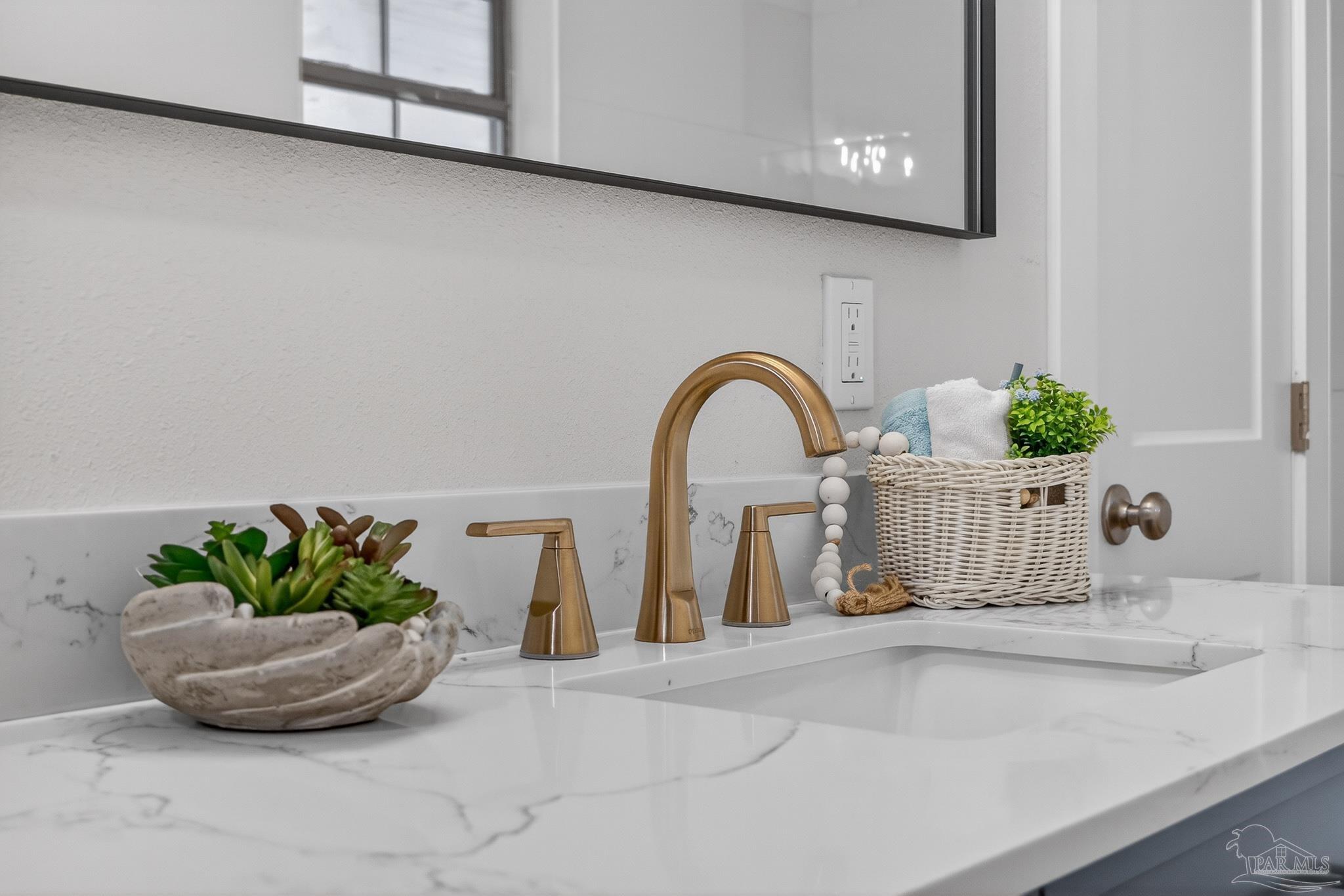 4771 Carl Booker Road Milton, FL 32583 - Photo 32 of 65 a vase of flowers sitting on a table