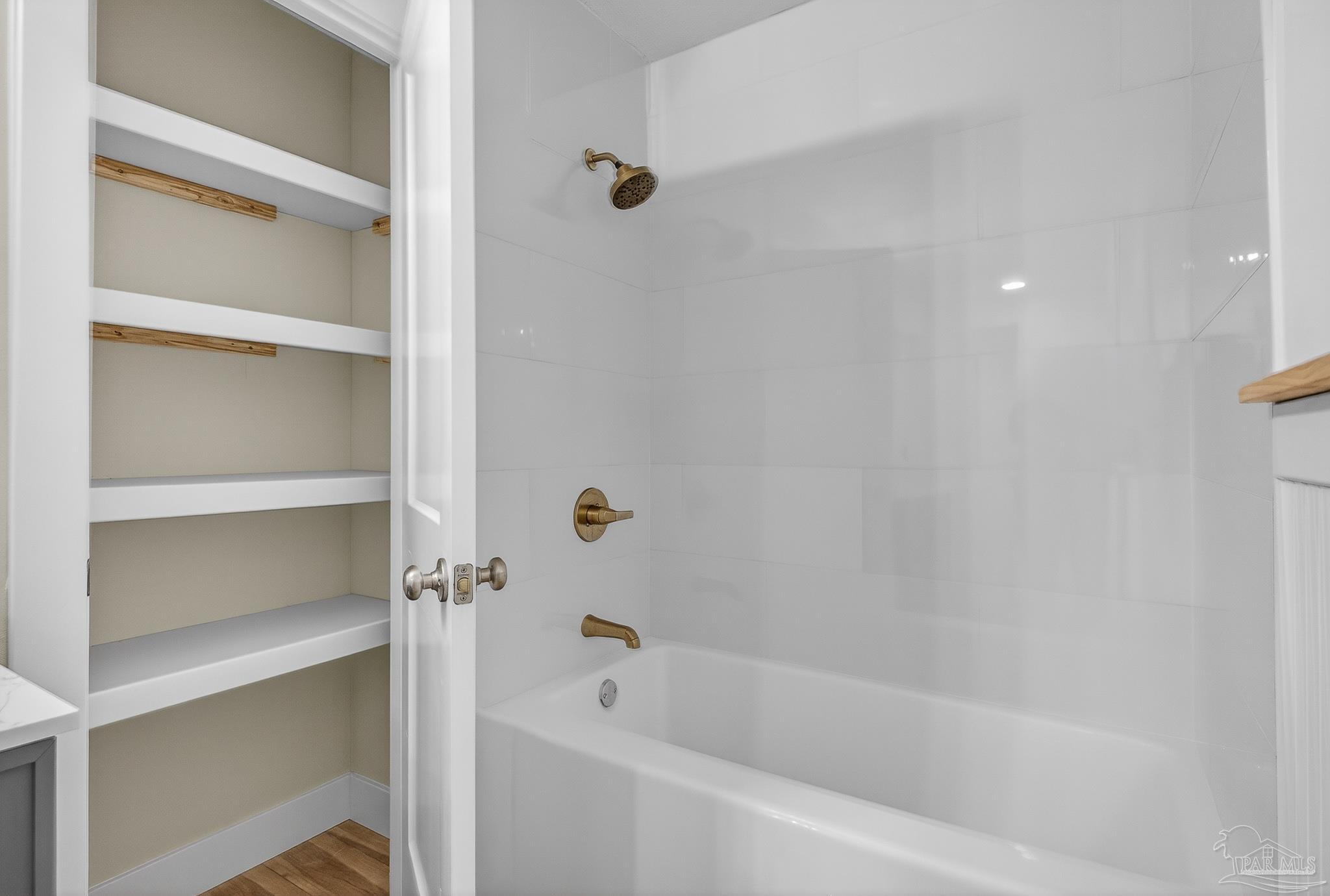 4771 Carl Booker Road Milton, FL 32583 - Photo 33 of 65 a bathroom with a bathtub